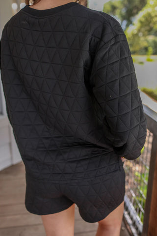 Jolie Quilted Set styled with accessories for a chic, comfortable outfit perfect for lounging or casual days out.