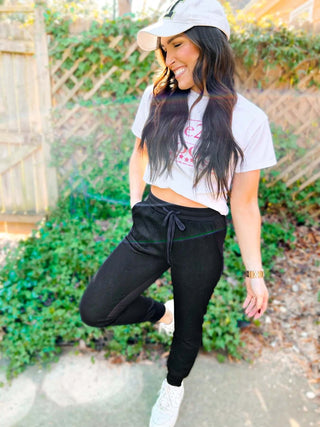 Woman wearing the Tommy Two Tone Waffle Front Joggers, styled casually for a relaxed, chic look.