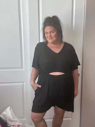 Woman wearing the Ryan Reversible Cutout Jumper, styled casually for a chic, versatile look.