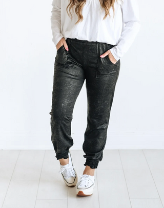 Woman wearing the Splatter Print Jogger, styled casually for a fun, laid-back look.