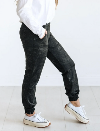 Woman wearing the Splatter Print Jogger, styled casually for a fun, laid-back look.