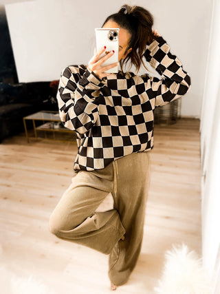 Woman wearing the Charlie Checkered Corded Set styled casually for a chic, comfortable look.