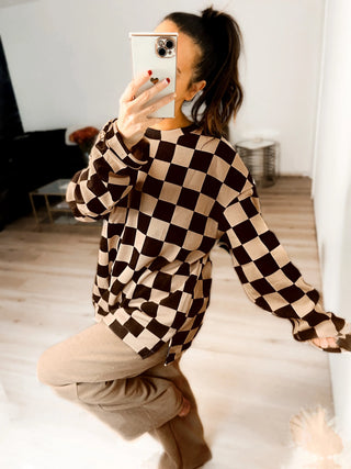 Woman wearing the Charlie Checkered Corded Set styled casually for a chic, comfortable look.