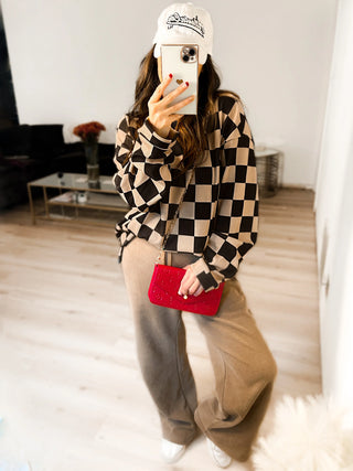 Woman wearing the Charlie Checkered Corded Set styled casually for a chic, comfortable look.