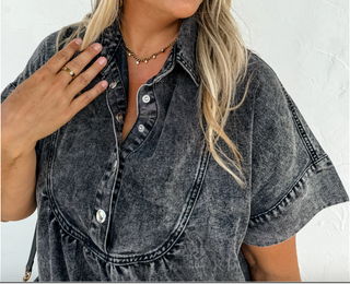Close-up view of the denim fabric and details on the Last Dance Denim Dress, highlighting its versatile design.