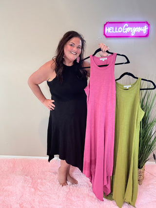 Model wearing Asymmetric Hem Dani Tank Dress with raw edge details and breezy, relaxed fit, showing all 3 colors: pink, black, and green.