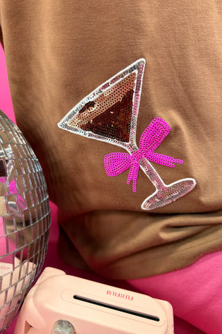 Close-up of lightweight sequin patch sewn onto the tee, highlighting sparkle and texture.