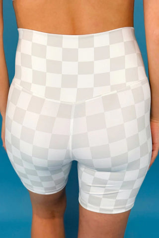 Back view of grey biker shorts, showcasing form-fitting silhouette and supportive design.