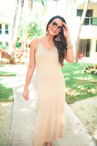 Woman wearing the Hannah Maxi Dress, styled for an elegant, flattering look perfect for any occasion.