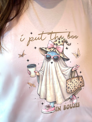 Tattoo of a ghost in a witch hat with text on a light background