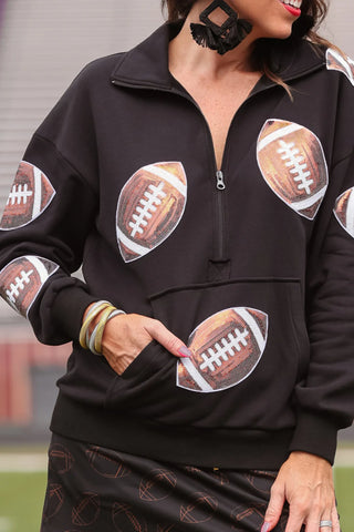 Close-up view of the quarter zip detail and soft fabric of the Kick Offer Quarter Zip Pullover.