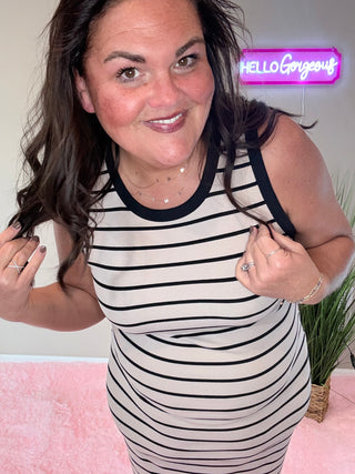 Close-up of ribbed texture and mocha stripe accents on the Mariah Dress—perfect for date nights and concerts.