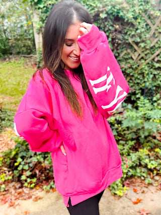 Woman wearing the ‘If You Can Read This’ Spring Scuba Sweatshirt, styled casually for a playful and relaxed look.