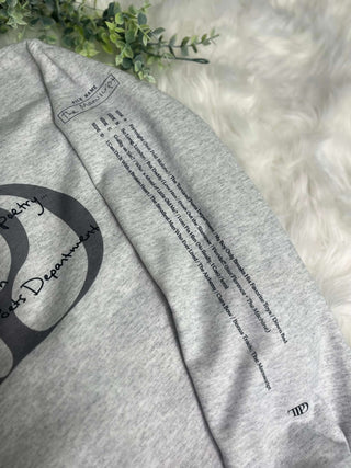 Close-up view of the design and soft fabric of Taylor Swift’s 'The Tortured Poets Department' Sweatshirt.