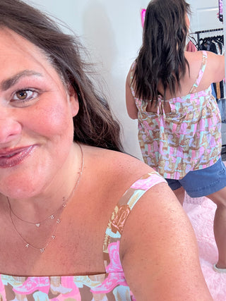 Comfy Cotton Boot Print Top – Rodeo Ruffle Sleeveless Top with a playful western boot pattern, flowy fit, and lightweight cotton feel.