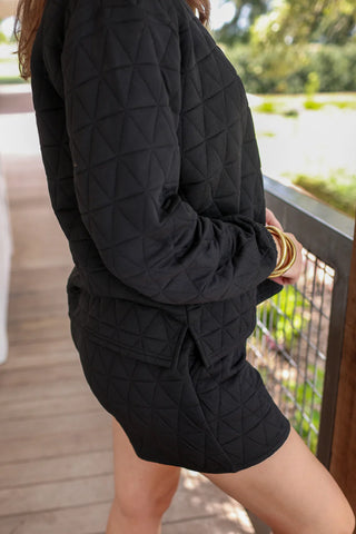 Side view of the quilted texture and soft fabric of the Jolie Quilted Set.
