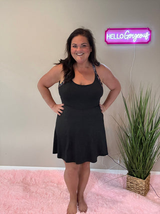 Small Town Girl Tennis Dress displayed flat with soft, breathable fabric and sporty, flattering fit.