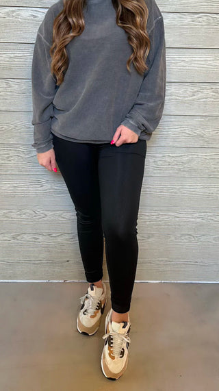 Woman wearing the Textured Leggings styled casually with a top for a chic and comfortable look.