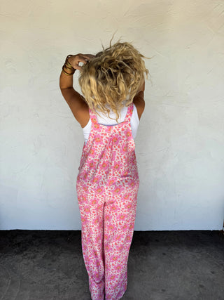 Back view of overalls showing pleat design for a draped, relaxed fit.