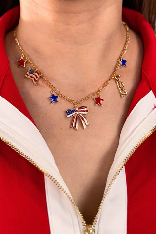 Firework Finale Charm Necklace featuring patriotic charms on a 16-inch 18K gold-plated brass chain, perfect for Fourth of July celebrations or festive style.