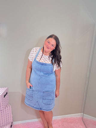 Denim Jumper Dress with Pockets - Jenna Style – Jenna Jumper Dress featuring a soft, stretchy denim blend, adjustable straps, and oversized front pockets.