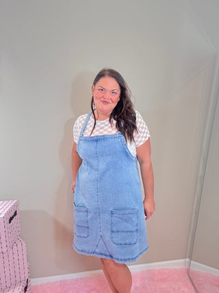 Versatile Denim Jumper Dress - Adjustable Straps – Jenna Jumper Dress with soft, stretchy denim, adjustable straps, and oversized front pockets.