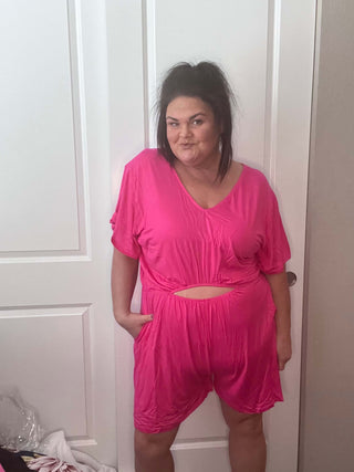 Woman wearing the Ryan Reversible Cutout Jumper, styled casually for a chic, versatile look.