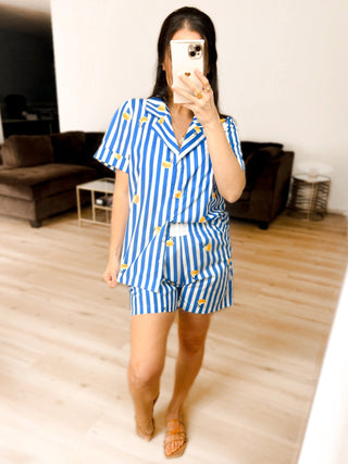 Lightweight linen-like lemon print set with coastal blue and white stripe.