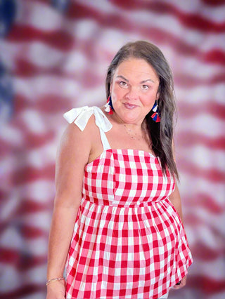 Cute Plaid Babydoll Top with Adjustable Straps – Sweet As Apple Pie Top with a flattering babydoll fit, adjustable tie straps, and smocked back for comfort.