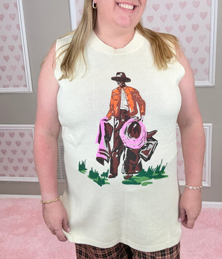 Person wearing a sleeveless top with a graphic design of a person in a cowboy outfit.