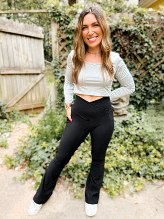 Woman wearing the Molly Max Sculpt Diagonal Ribbed-Flare Legging styled with a casual or sporty top for a sleek, flattering look.