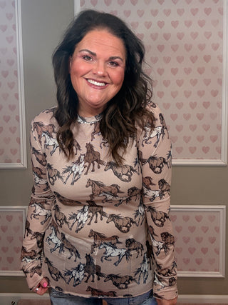 Lightweight horse print mesh layering top with high neckline and fitted stretch silhouette styled for western women’s clothing look.