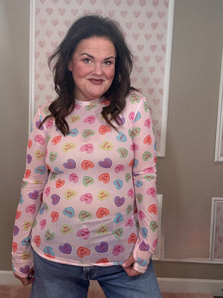 Sheer candy heart mesh long sleeve top styled for trendy clothes and chic mom-approved looks, offering soft stretch and effortless comfort.