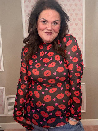 Pucker Up mesh long sleeve top for women with sheer mesh fabric and kiss-inspired print, a versatile piece for fashion trends, moms style finds, and plus size trends.