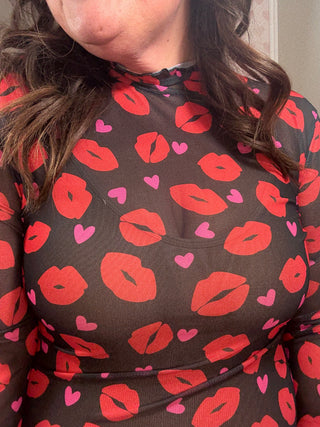 Pucker Up mesh long sleeve top for women with sheer mesh fabric and kiss-inspired print, a versatile piece for fashion trends, moms style finds, and plus size trends.