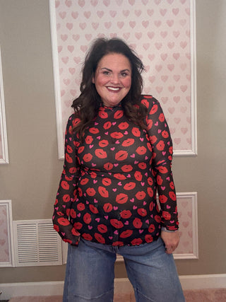 Pucker Up mesh long sleeve top for women with sheer mesh fabric and kiss-inspired print, a versatile piece for fashion trends, moms style finds, and plus size trends.