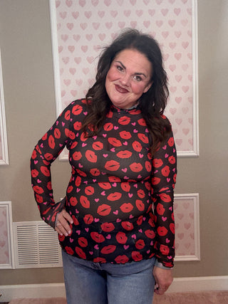 Pucker Up mesh long sleeve top for women with sheer mesh fabric and kiss-inspired print, a versatile piece for fashion trends, moms style finds, and plus size trends.