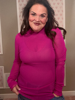 Magenta glitter mesh long sleeve top for women, showcasing sheer sparkly fabric and a flattering fit that works beautifully for mom outfit inspo and plus size trends.
