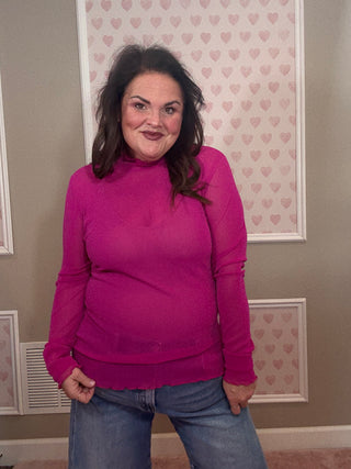 Magenta glitter mesh long sleeve top for women, showcasing sheer sparkly fabric and a flattering fit that works beautifully for mom outfit inspo and plus size trends.