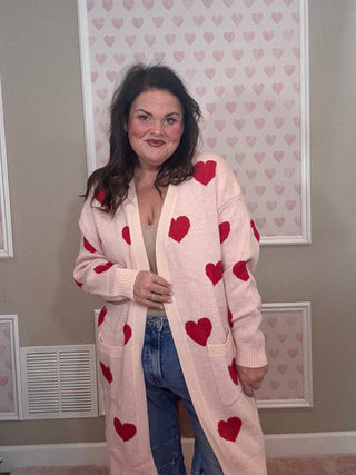 Love Story cardigan with hearts for women featuring a flattering relaxed fit and charming heart design, a cozy statement piece for fashion trends, women’s clothing, and plus size trends.
