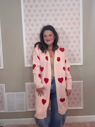 Love Story cardigan with hearts for women featuring a flattering relaxed fit and charming heart design, a cozy statement piece for fashion trends, women’s clothing, and plus size trends.