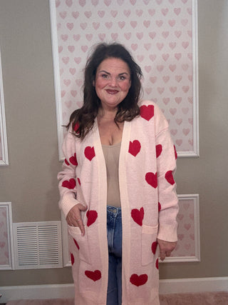 Love Story cardigan with hearts for women featuring a flattering relaxed fit and charming heart design, a cozy statement piece for fashion trends, women’s clothing, and plus size trends.