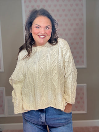 Slouchy ombre cable knit sweater for women with textured cable knit detail and flattering relaxed silhouette, a statement piece for fashion trends, women’s clothing, and plus size trends.