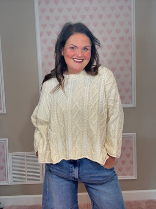 Slouchy ombre cable knit sweater for women with textured cable knit detail and flattering relaxed silhouette, a statement piece for fashion trends, women’s clothing, and plus size trends.