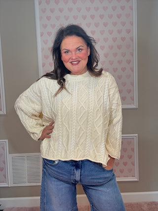 Slouchy ombre cable knit sweater for women with textured cable knit detail and flattering relaxed silhouette, a statement piece for fashion trends, women’s clothing, and plus size trends.