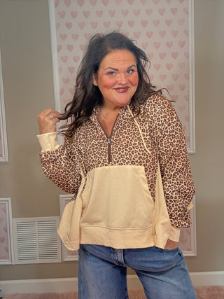 Hunter half zip hoodie pullover for women in cheetah print with a flattering relaxed fit and cozy feel, ideal for trendy clothes, mom outfit inspo, and plus size trends.