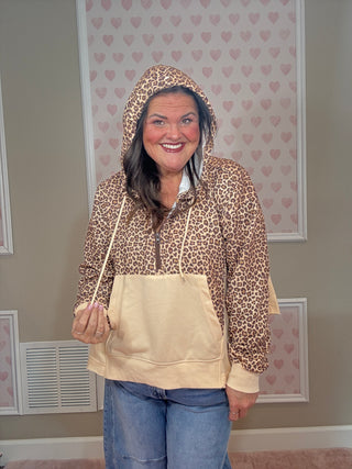 Hunter half zip hoodie pullover for women in cheetah print with a flattering relaxed fit and cozy feel, ideal for trendy clothes, mom outfit inspo, and plus size trends.
