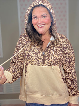 Hunter half zip hoodie pullover for women in cheetah print with a flattering relaxed fit and cozy feel, ideal for trendy clothes, mom outfit inspo, and plus size trends.