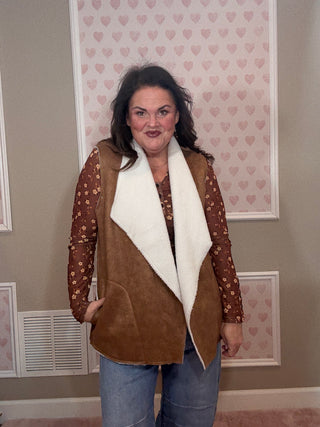 Collins suede vest with sherpa lining for women featuring a soft suede exterior and cozy sherpa interior, perfect for layering and women’s clothing styles.