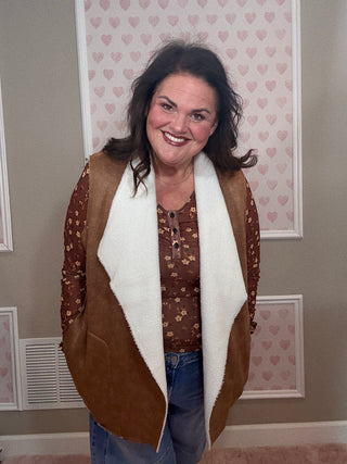 Collins suede vest with sherpa lining for women featuring a soft suede exterior and cozy sherpa interior, perfect for layering and women’s clothing styles.